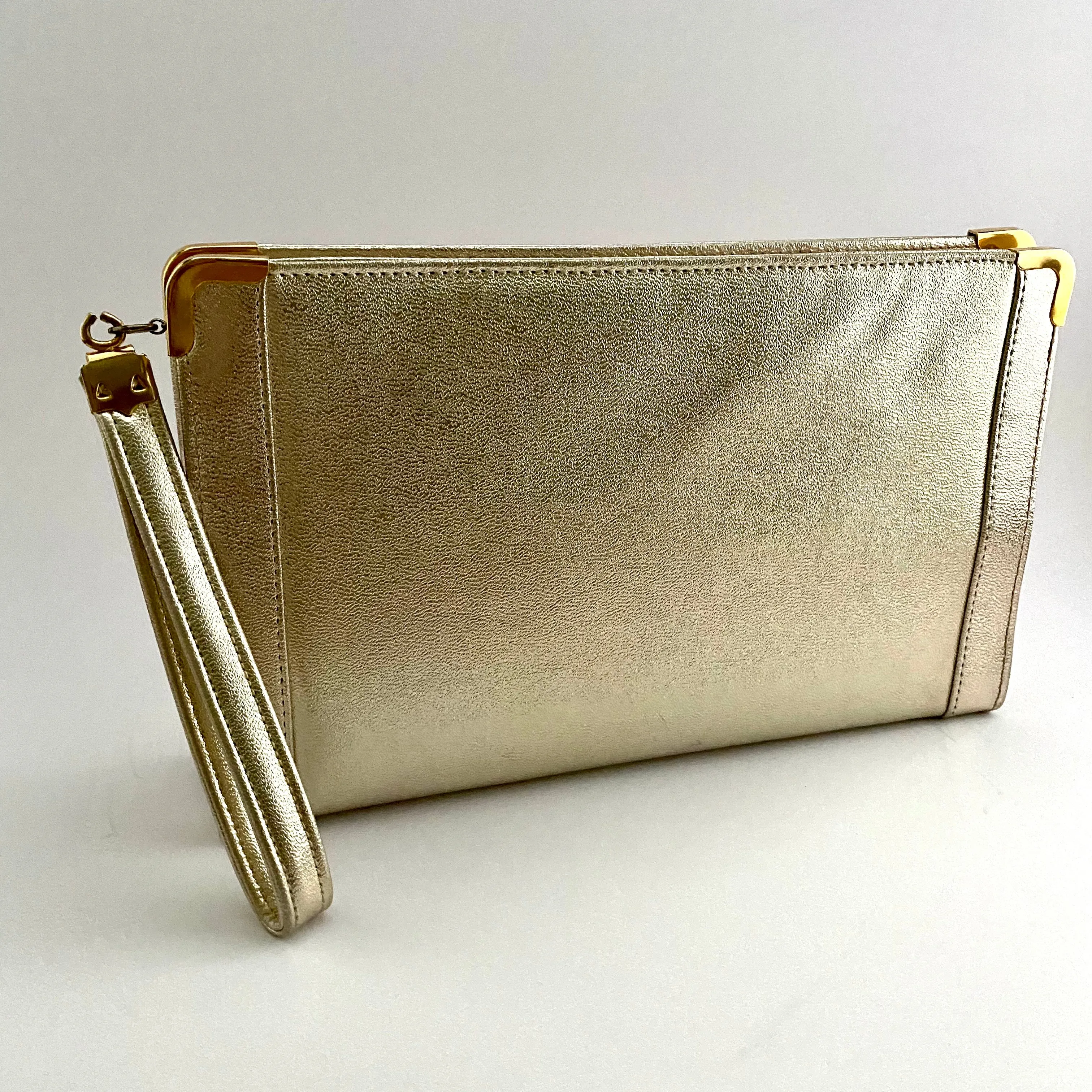 1960s Andé Metallic Pale Gold Wristlet Clutch