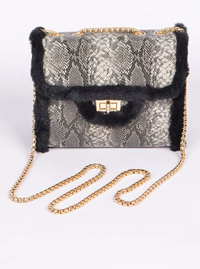 Faux snakeskin clutch