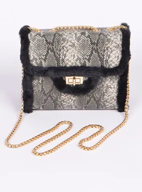 Faux snakeskin clutch