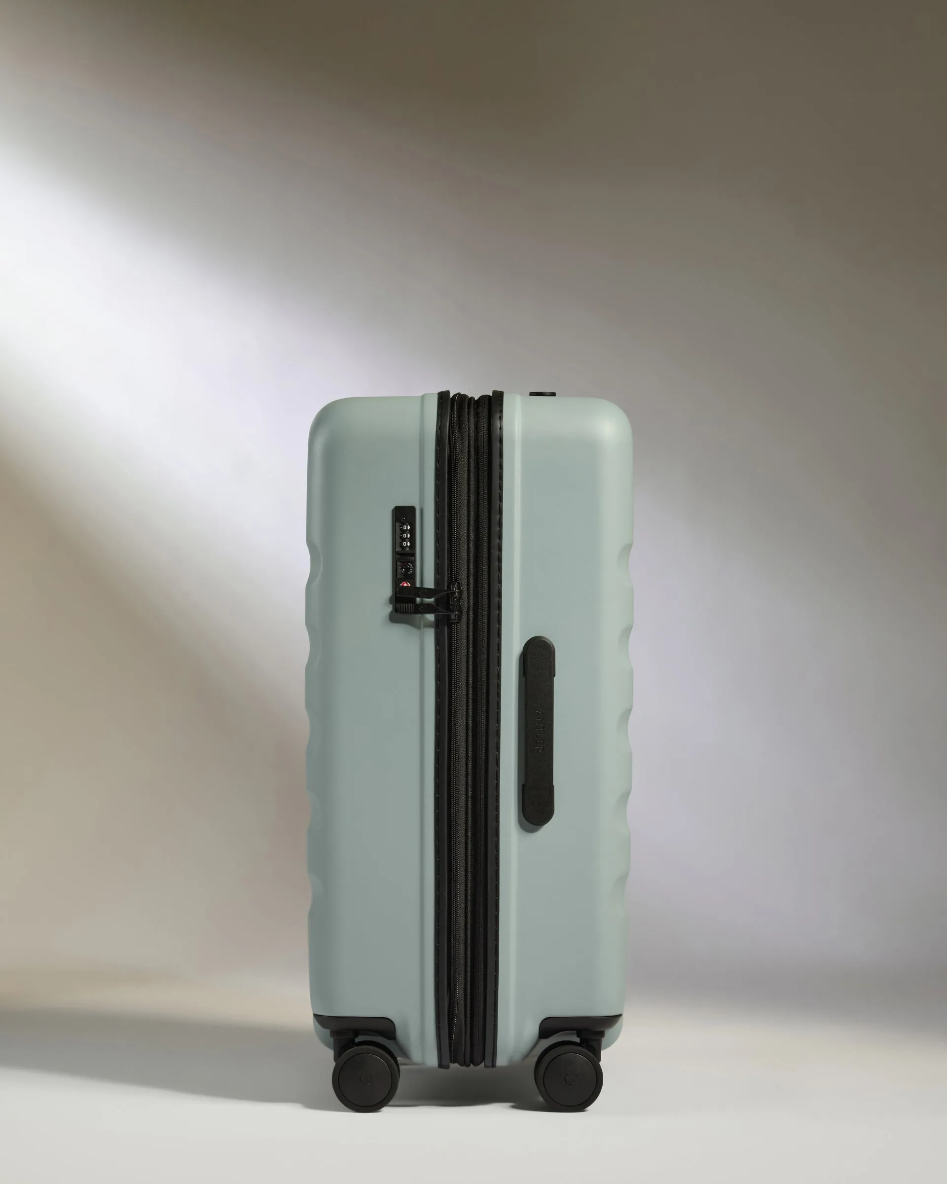 Medium Suitcase in Mist Blue - Icon Stripe