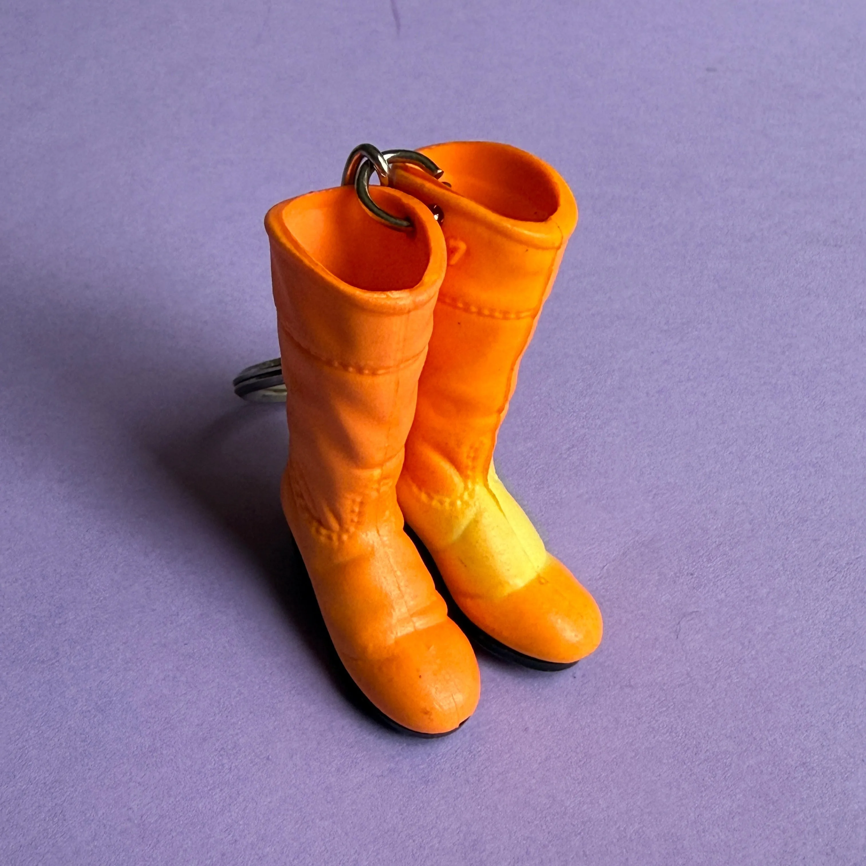 Neon 80s plastic orange boots charm