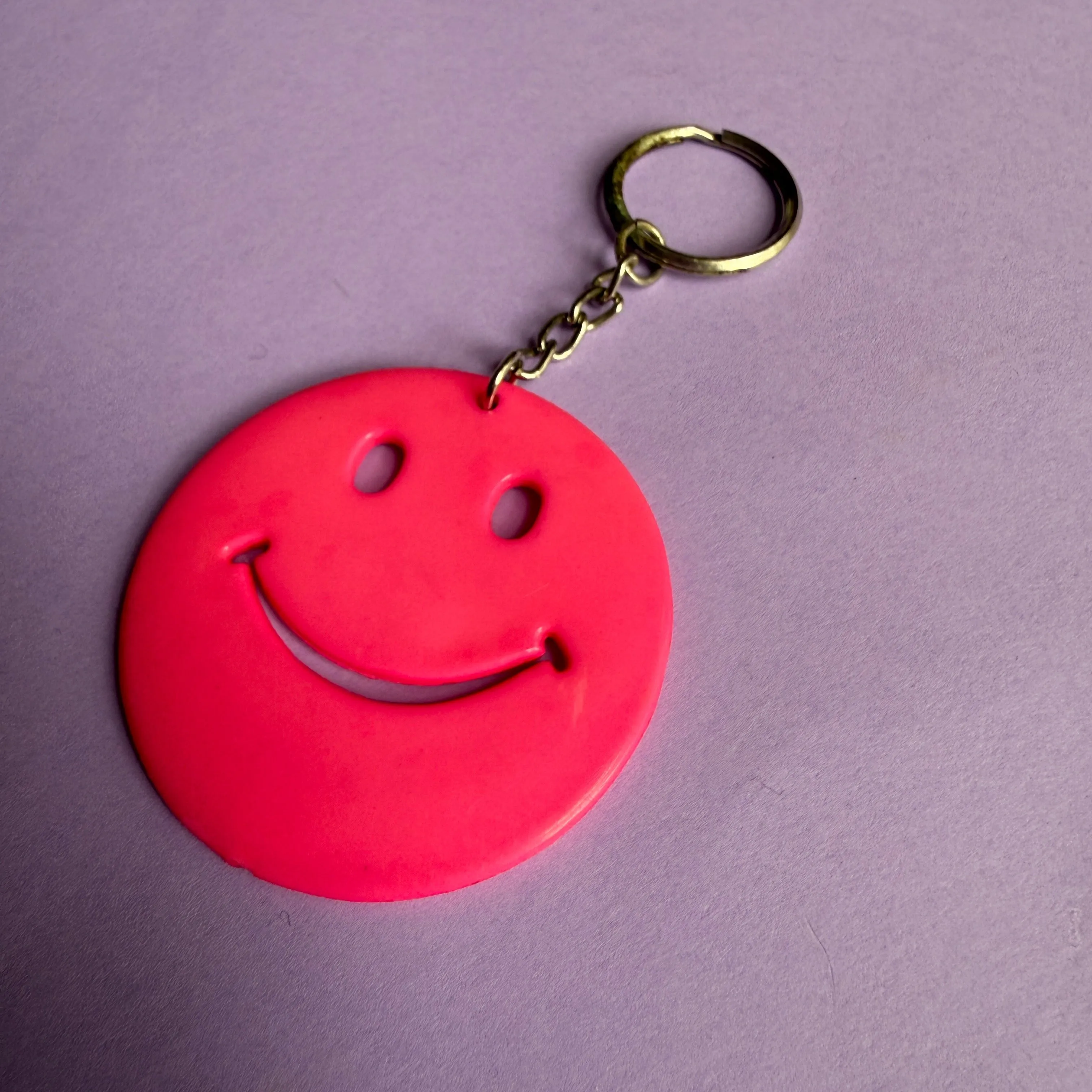 Neon 80s plastic smiley charm